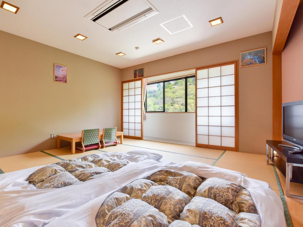 Hotel Momijigawa Onsen à Naka Extérieur photo
