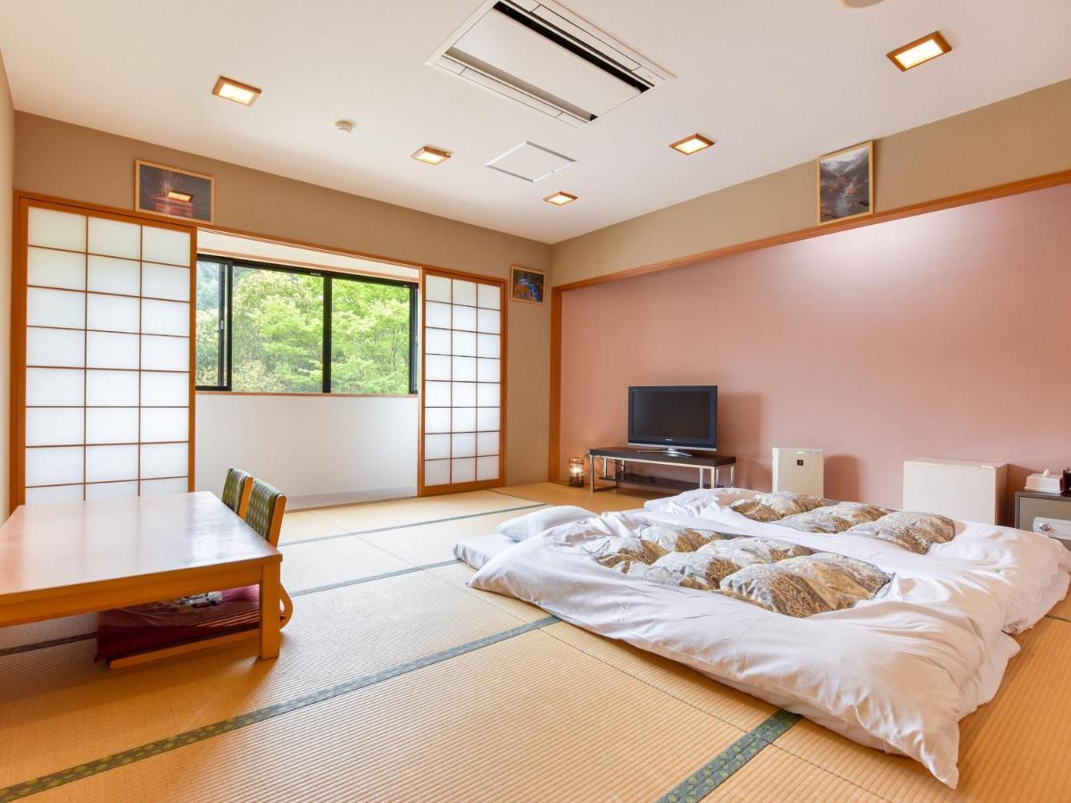Hotel Momijigawa Onsen à Naka Extérieur photo